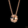 Custom design jewelry 18 kt rose gold necklace set with onyx elements and pavé diamonds on the pendant.