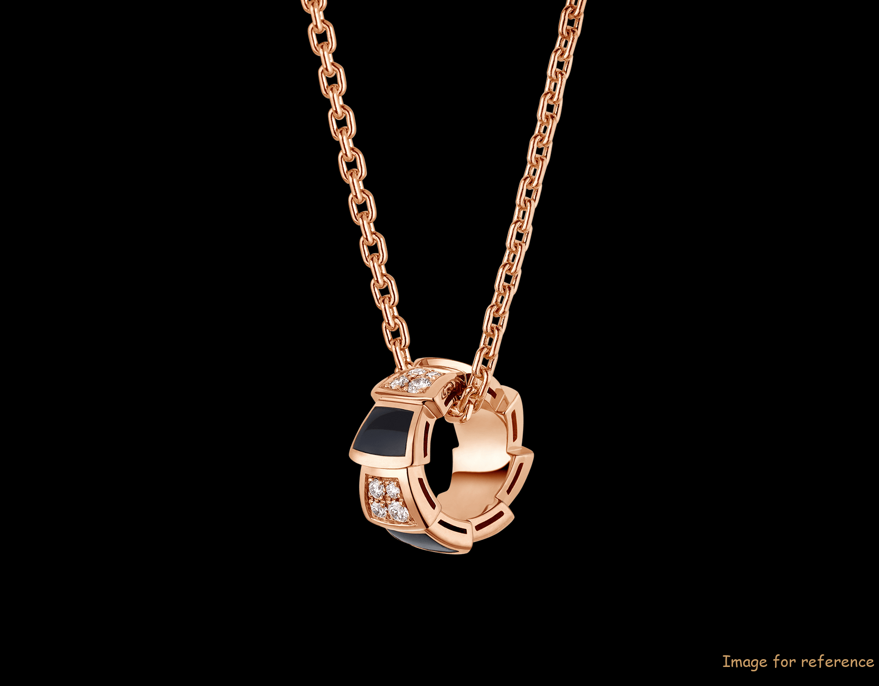 Custom design jewelry 18 kt rose gold necklace set with onyx elements and pavé diamonds on the pendant. Custom design jewelry 18 kt rose gold necklace set with onyx elements and pavé diamonds on the pendant.