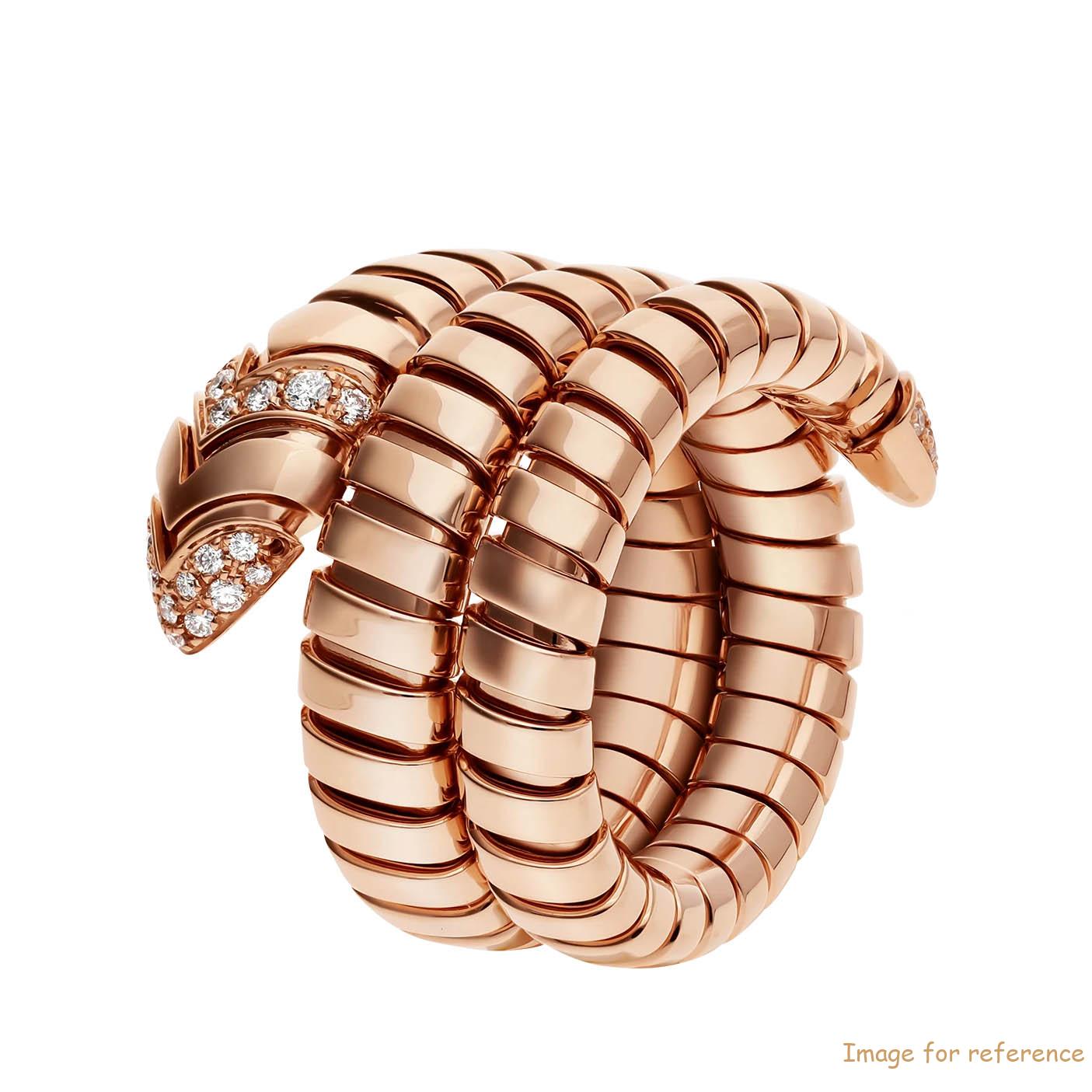 Custom design ouble spiral ring in 18 kt rose gold, set with pavé diamonds on the tail and the head OEM Jewelry manufacturers