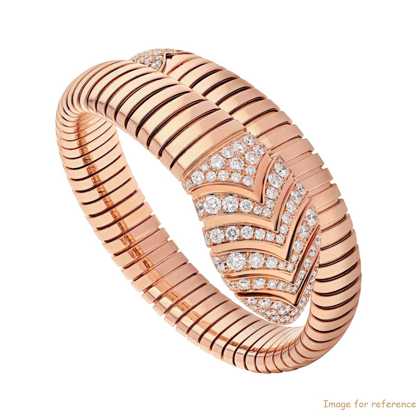 OEM made of single spiral bracelet in 18 kt rose gold plated on sterling silver OEM made of single spiral bracelet in 18 kt rose gold plated on sterling silver